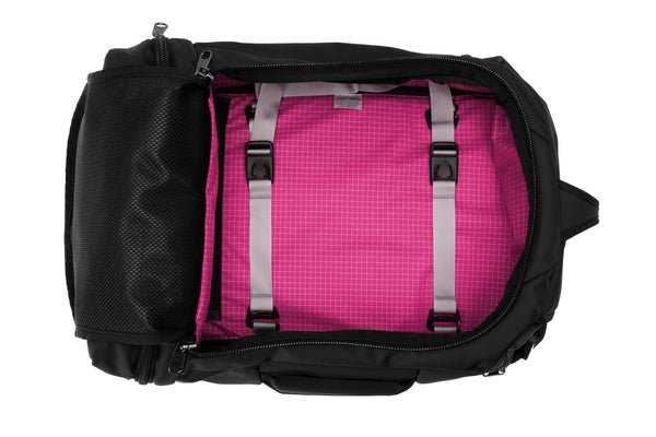 An open Techonaut 30 with a Black exterior and a Cerise (bright pink) interior.